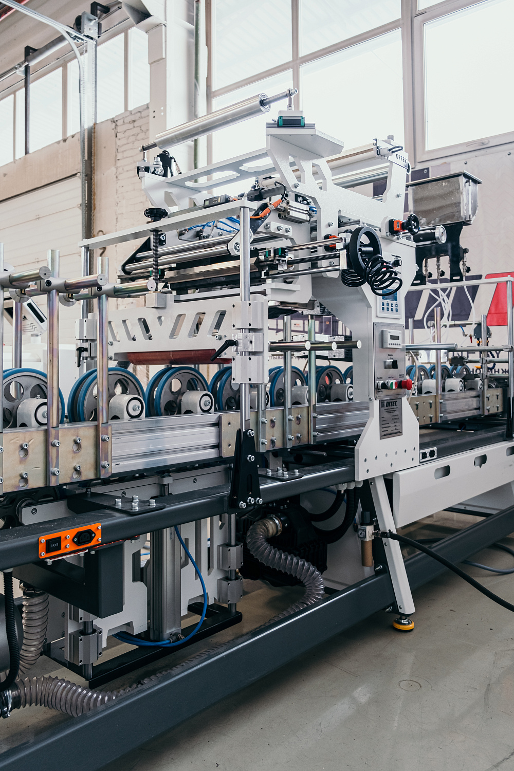 Станок окутывания профильных погонажных изделий DITEC Line 6000/А PUR